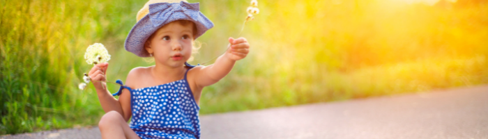 love of a child, a kiddo giving a flower